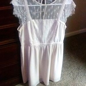 Very feminine,chiffon, soft blush colored dress.